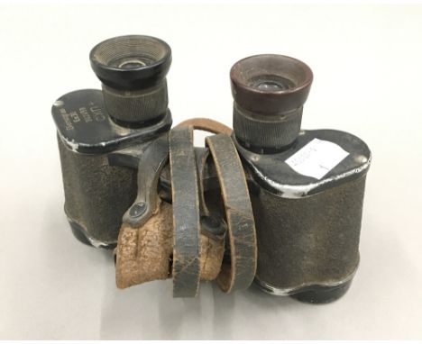 A pair of German WWII Dienstglas binoculars by Emil Busch 6x30 CXN with shoulder and button straps, Number 362459