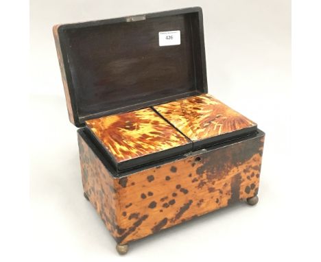 A Japanese tortoiseshell tea caddy