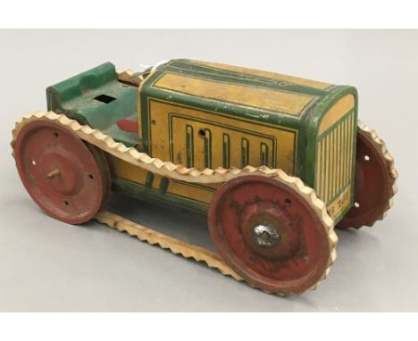 A vintage German tinplate tractor