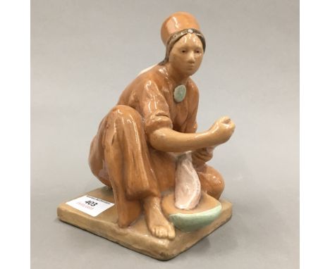 A Russian pottery model of a girl