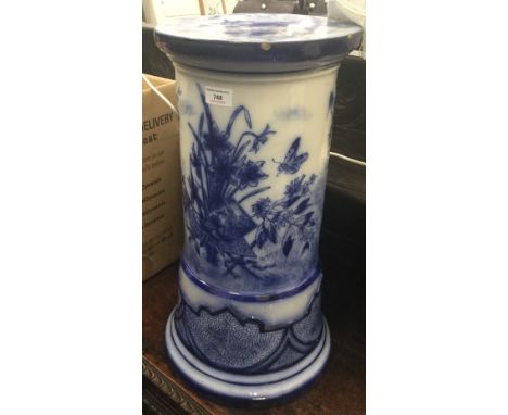 A Victorian blue and white ceramic jardiniere stand