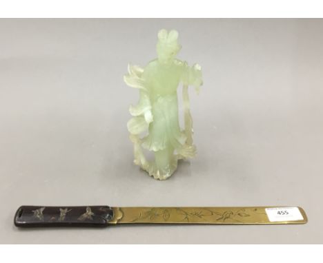 A Chinese model of Guanyin and a Japanese paperknife