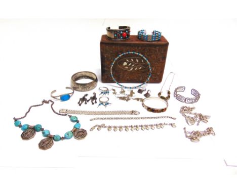 A COLLECTION OF SILVER AND WHITE METAL JEWELLERY  in a carved sandalwood box, including; several items set with turquoise inc