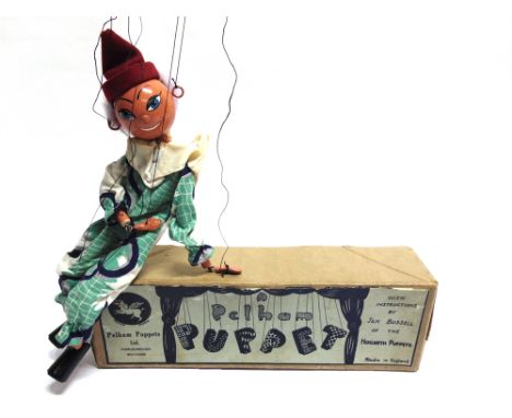 A PELHAM PUPPET CLOWN  with painted metal hands, in an early box. 