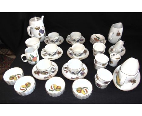 A COLLECTION OF ROYAL WORCESTER 'EVESHAM' CERAMICS  including coffee pot, cups and saucers, milk jug etc.