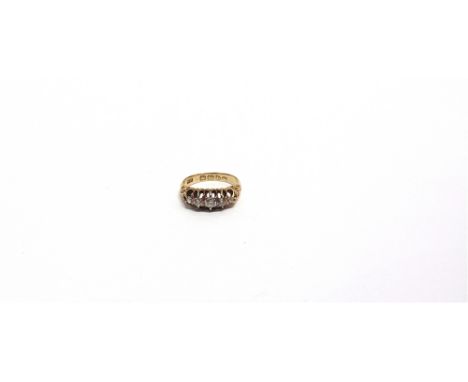 AN 18CT GOLD AND DIAMOND FIVE STONE GYPSY RING the graduated old-cut stones approx. 0.36cts total, claw set between scroll ch