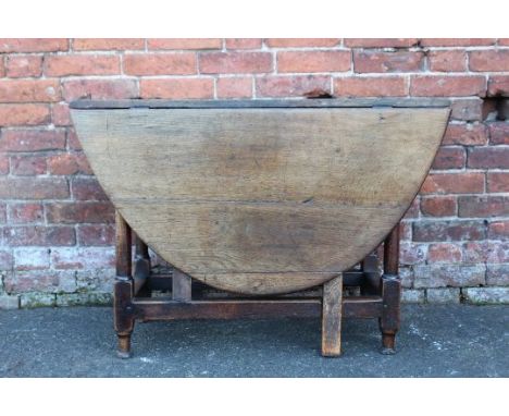 A NINETEENTH CENTURY OAK DROPLEAF GATE LEG TABLE, H 69 cm W 141 cm