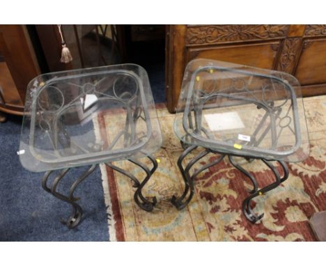 A PAIR OF GLASS TOPPED LAMP TABLES