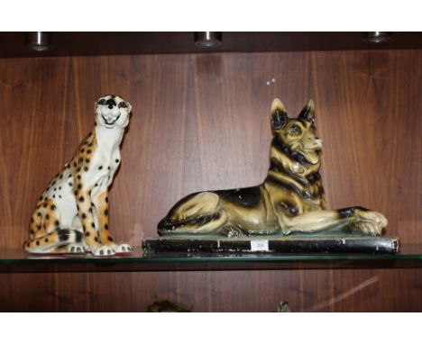 A VINTAGE CHALK FIGURE OF AN ALSATIAN FIGURE W 57 CM, TOGETHER WITH A FIRESIDE SEATED CHEETAH FIGURE (2)