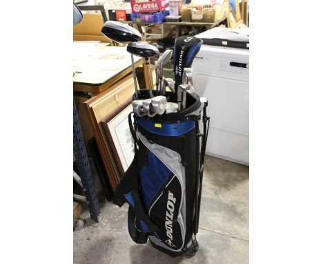 A DUNLOP GOLF CADDY BAG TOGETHER WITH DUNLOP CLUBS
