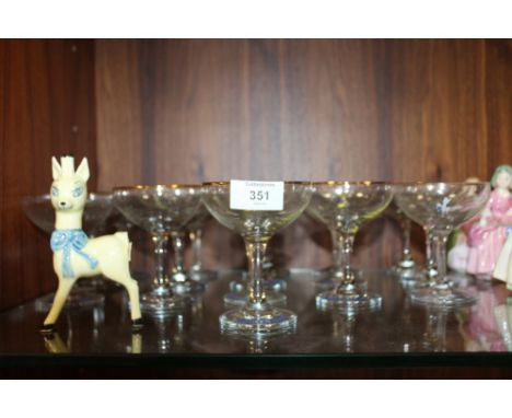 A COLLECTION OF 16 VINTAGE BABYCHAM GLASSES TOGETHER WITH A CARLTONWARE BABYCHAM FIGURE