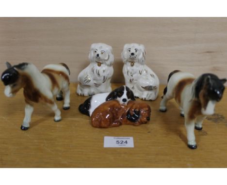 TWO GOEBEL SHETLAND PONY FIGURES TOGETHER WITH A PAIR OF BESWICK STAFFORDSHIRE STYLE SPANIEL FIGURES AND A ROYAL DOULTON DOG 