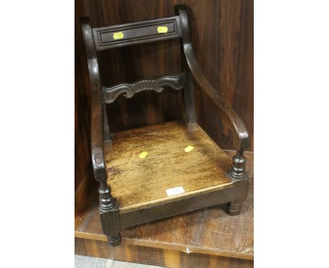 A VINTAGE MAHOGANY CHILD SIZE ARM CHAIR - SHORTENED LEGS - H 46 CM