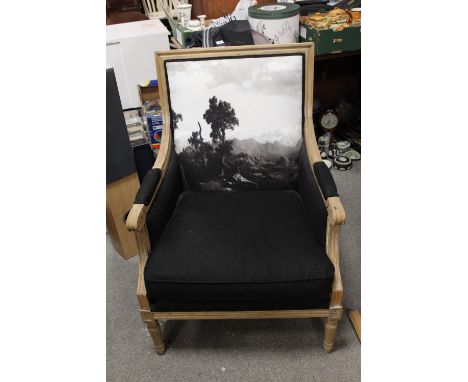 A MODERN LOUIS XV STYLE UPHOLSTERED ARMCHAIR WITH LANDSCAPE PRINT SCENE