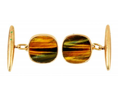 A PAIR OF TIGER'S EYE AND GOLD CUFFLINKS 1.4 x 1.4cm, marked 9ct, 6.4g ++Satisfactory second hand condition 