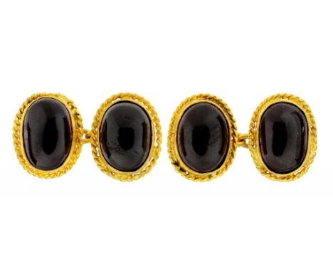A PAIR OF FOILED GARNET AND GOLD CUFFLINKS 1.1 x 1.4cm, unmarked, 9.6g ++Both in satisfactory second hand condition the caboc