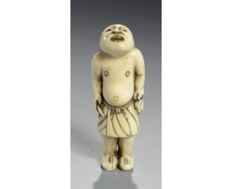 AN IVORY NETSUKE OF A SOUTH SEA DIVER HOLDING A KNIFE, 19TH C  6cm h ++Good condition