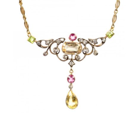 AN ART NOUVEAU DIAMOND, PERIDOT, YELLOW ZIRCON AND PINK TOURMALINE NECKLET, C1905  in gold, 4.6 x 5.1cm, marked on ring 15ct,