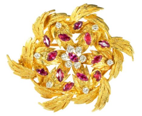 A FRENCH RUBY AND DIAMOND BROOCH, C1960 with round brilliant cut diamonds and marquise rubies, in gold, 5.1 x 4.7cm, marked 1