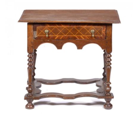 A DUTCH OAK, WALNUT AND LINE INLAID SIDE TABLE, EARLY 18TH C AND LATER  the arcaded apron fitted with a drawer, on bobbin tur