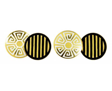 A PAIR OF GOLD AND BLACK AND WHITE ENAMEL CUFFLINKS 1.3cm diam, marked 18, 8.4g ++Both in satisfactory second hand condition 