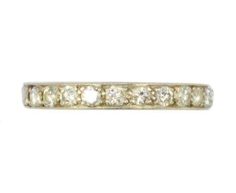 A DIAMOND ETERNITY RING  unmarked, 4.6g, size R ++In average second hand condition, complete, no repair