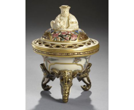 A ROYAL WORCESTER POT POURRI BOWL AND COVER, 1874  of moulded 'Old Ivory', painted in enamels and gilt, on three elephant hea