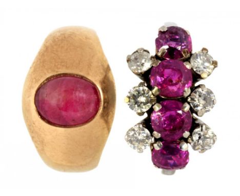 A RUBY RING, C MID 20TH C with a single oval ruby en cabochon, plain gold band, unmarked and a ruby and white stone ring, in 