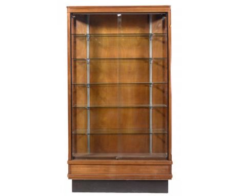 A SET OF THREE MAHOGANY SHOWROOM CABINETS, C1960  with chromium plated shelf brackets, plate glass shelves and sliding doors,