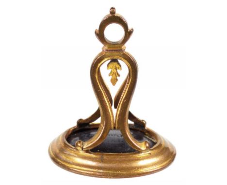 AN ENGLISH COPPER GILT AND WEDGWOOD & BENTLEY LAPARDARY  POLISHED BLACK BASALT SEAL, C1775  3.1cm h, intaglio impressed WEDGW