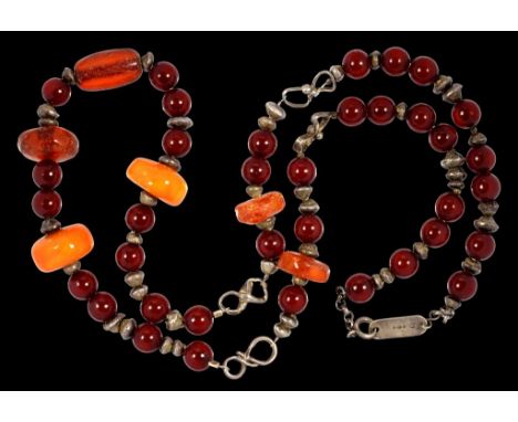 AN AMBER, CHERRY AMBER AND SILVER BEAD NECKLACE approx 70cm, Sheffield 1988   ++In satisfactory condition Mementos of R K Neh