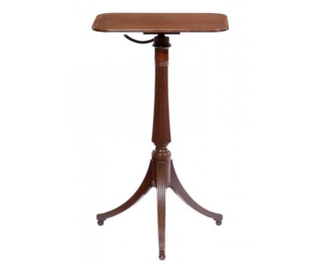 A GEORGE III MAHOGANY TRIPOD TABLE, C1800 the adjustable telescopic oblong top crossbanded in rosewood and line inlaid, on ta