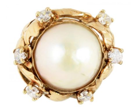 A MABE PEARL AND DIAMOND RING  in gold, of leafy foliate openwork design with bifurcated shoulders, indistinctly marked, 10.6