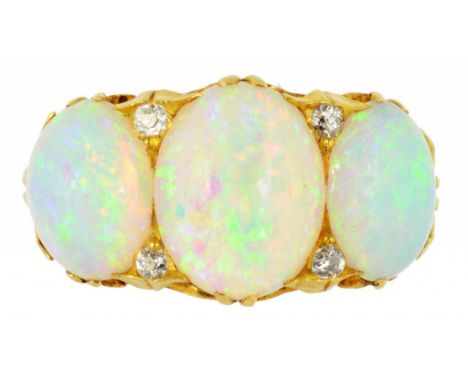 AN OPAL THREE STONE RING  with four evenly sized small old cut diamonds, in gold, unmarked, 6.9g, size M ++In satisfactory se