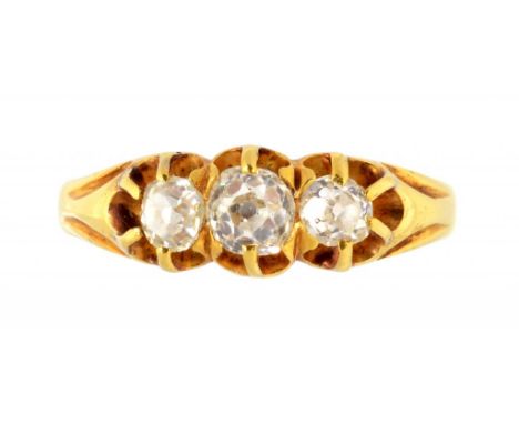 A DIAMOND THREE STONE RING, C1900  with old cut diamonds, in gold, unmarked, 2.9g, size M½ ++Satisfactory condition consisten