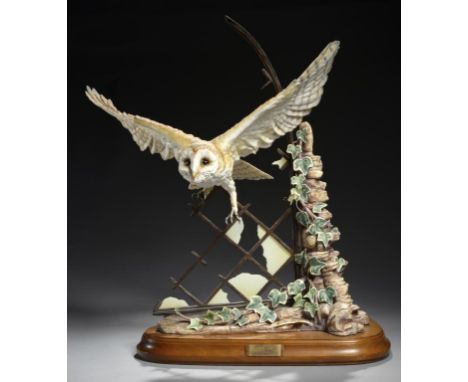 A DAVID FRYER ROYAL WORCESTER MODEL OF A BARN OWL IN FLIGHT, 1984, model 4210 limited edition of 100, of glazed porcelain, br