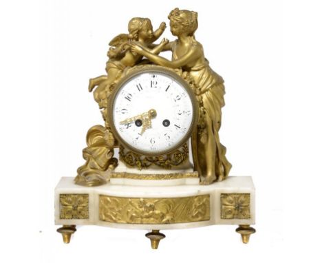 A FRENCH ORMOLU AND STATUARY MARBLE MANTLE CLOCK, LATE 19TH C the drum cased movement striking on a bell,  with enamel dial a