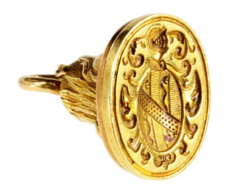 A GOLD FOB SEAL, C1900  the shank in the form of a tree trunk, armorial engraved matrix, 2cm, 11g ++In good condition, consis