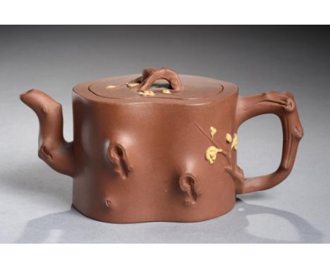 AN YIXING STONEWARE TEAPOT AND COVER  in the form of a section of tree trunk with applied buff clay detail, 9cm h, impressed 