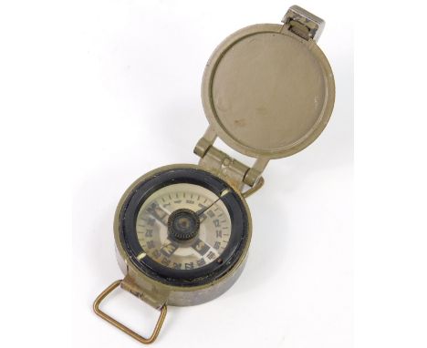 A New Zealand military compass, gun metal case, stamped NZ01389.