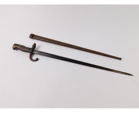 A St Etienne bayonet 1882, with scabbard, 65.5cm long.