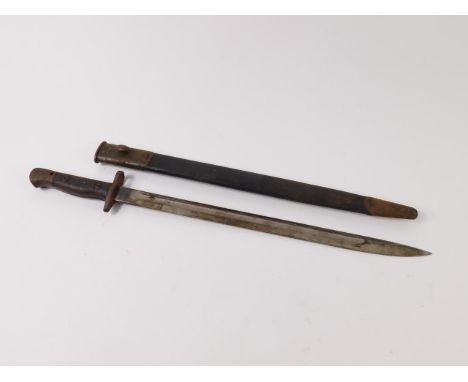 A British pattern 1907 bayonet, with scabbard, 57cm long.