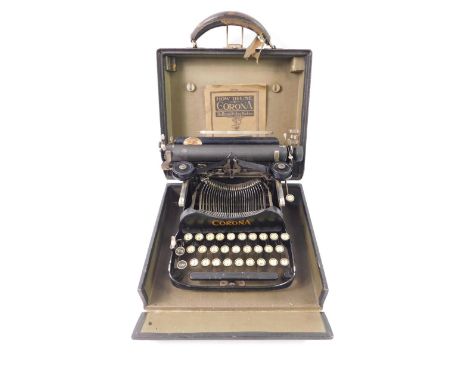 A Corona typewriter No 3, of folding form, No 228875, cased, with instructions.