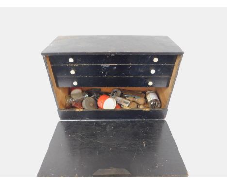 An engineer's or model maker's bench top black painted tool cabinet, containing miscellaneous related tools. 