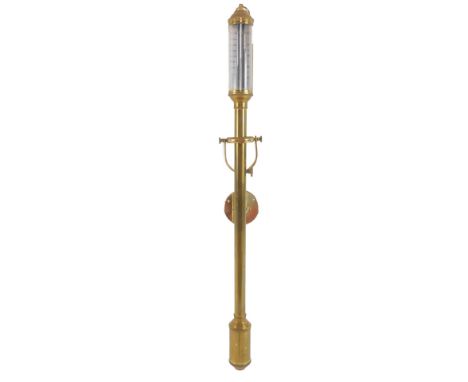 A Dejoka brass ships barometer, with a gimbal bracket, 93cm high. 