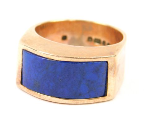 A 9ct gold and Lapis Lazuli signet ring, channel set, size H, 9.2g. 