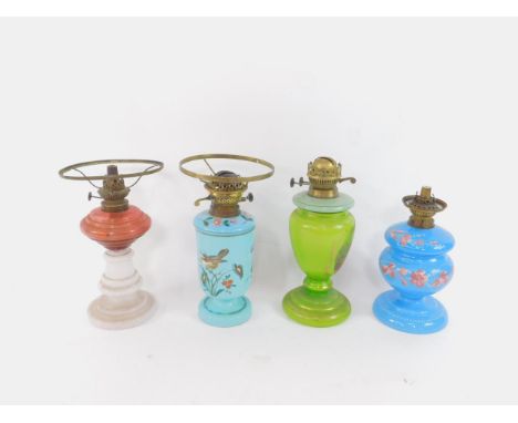 A French turquoise blue glass oil lamp, late 19thC, painted with birds and flowers, further blue glass oil lamp base, enamel 