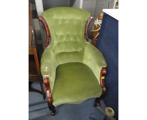 A Victorian mahogany framed, button back armchair