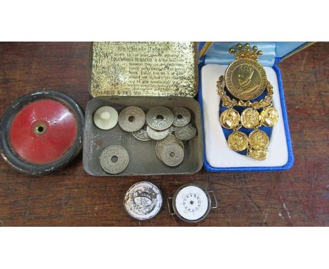 A small group of early 20th century French coinage, a replica coin pendant, a ladies silver cased wristwatch A/F, a Mecanno w
