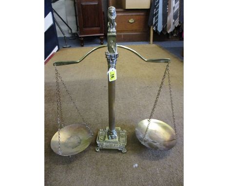 A brass scales of justice and mixed table lamps